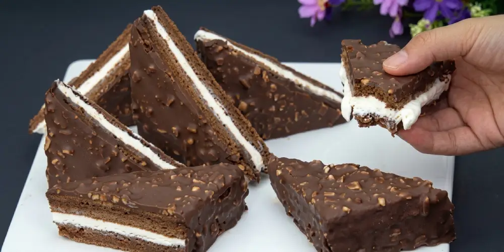 طرز تهیه شیرینی سه گوش و برش آن